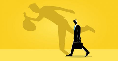 Businessman Walking as Shadow Shows Him Running with a Bag