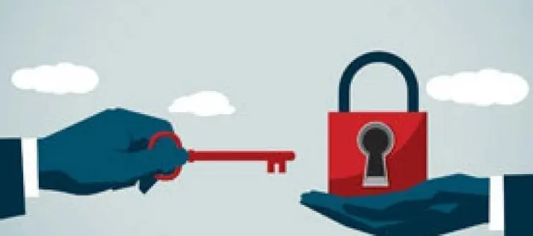 Person Holding a Lock and Key