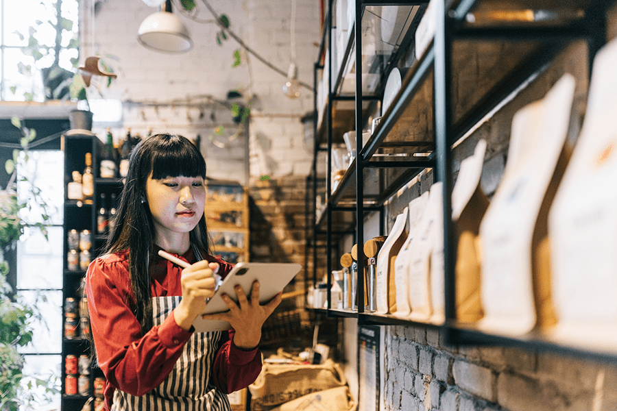 business woman checking her food and beverage inventory