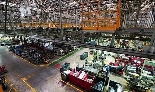 Modern automatic automobile manufacturing workshop. A busy car production line. Industrial scenery background.