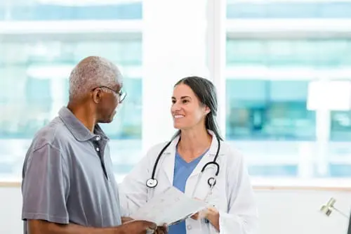 doctor speaking to patient