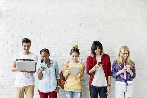Diversity Friends Using Digital Devices Concept