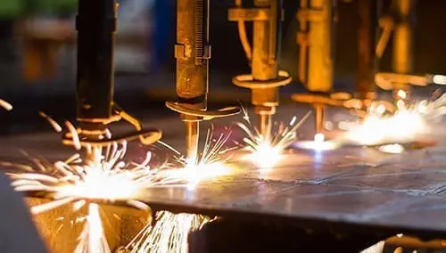CNC LPG cutting with sparks close up