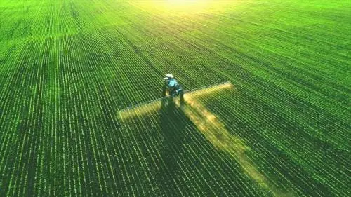 birds eye view of farming equipment in a field