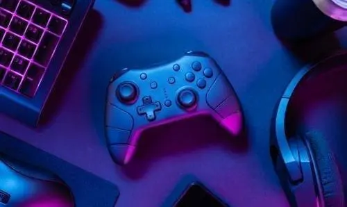 gaming controller and headphones