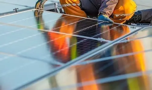 Solar panels installation on rooftop, ideal for any renewable article or wallpaper