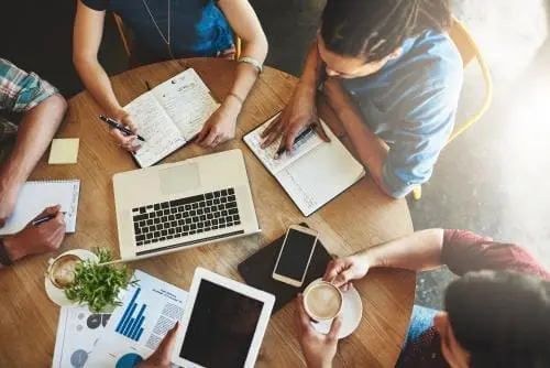 coworkers collaborating around a table