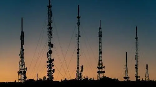 Telecommunications towers at sunrise