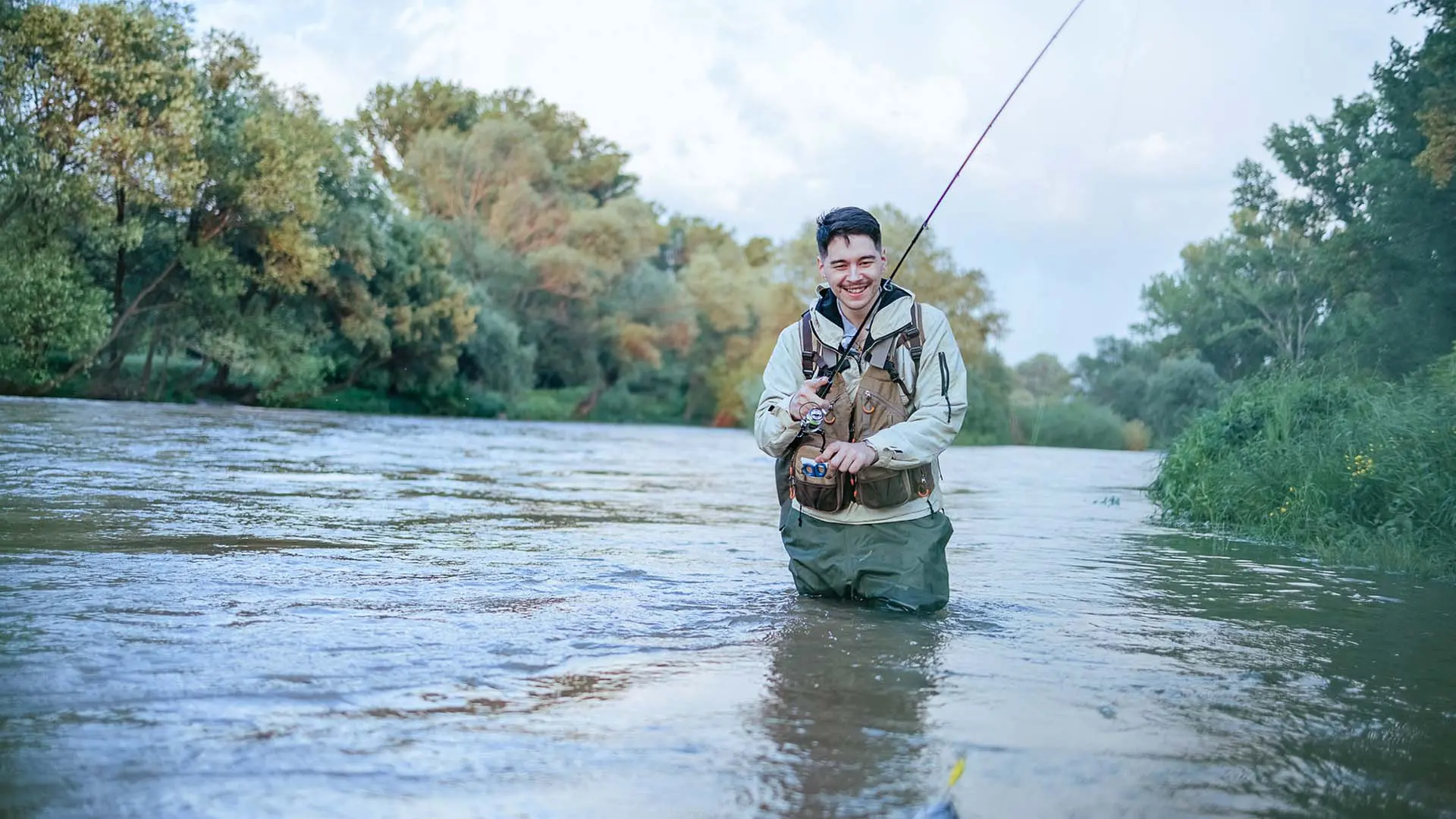 man fly fishing