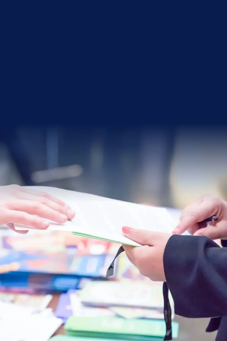 people exchanging documents