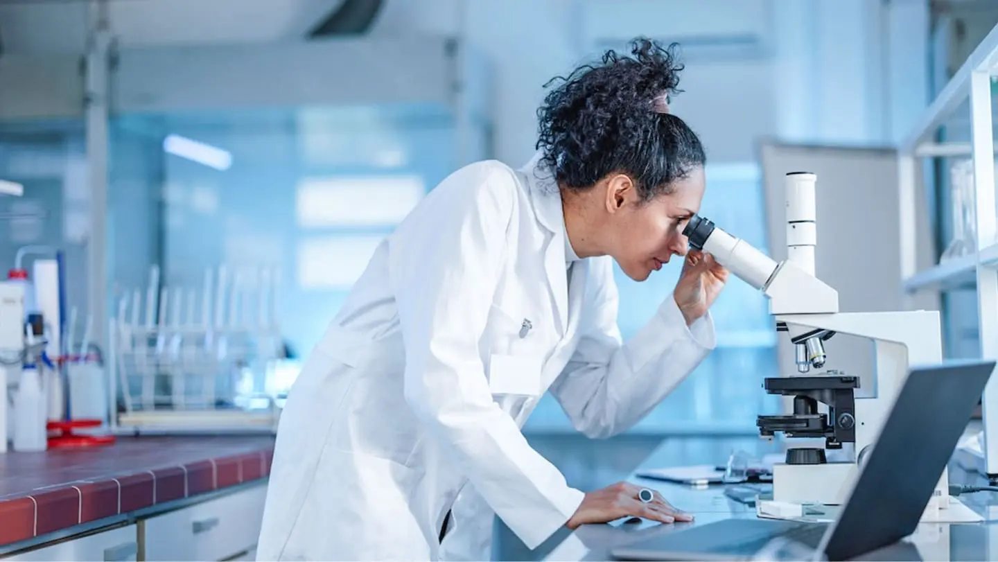 Woman in lab doing research