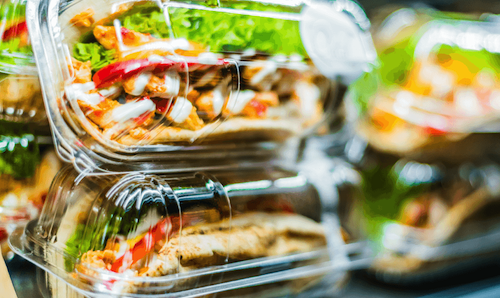 Sandwiches in a container on a store shelf