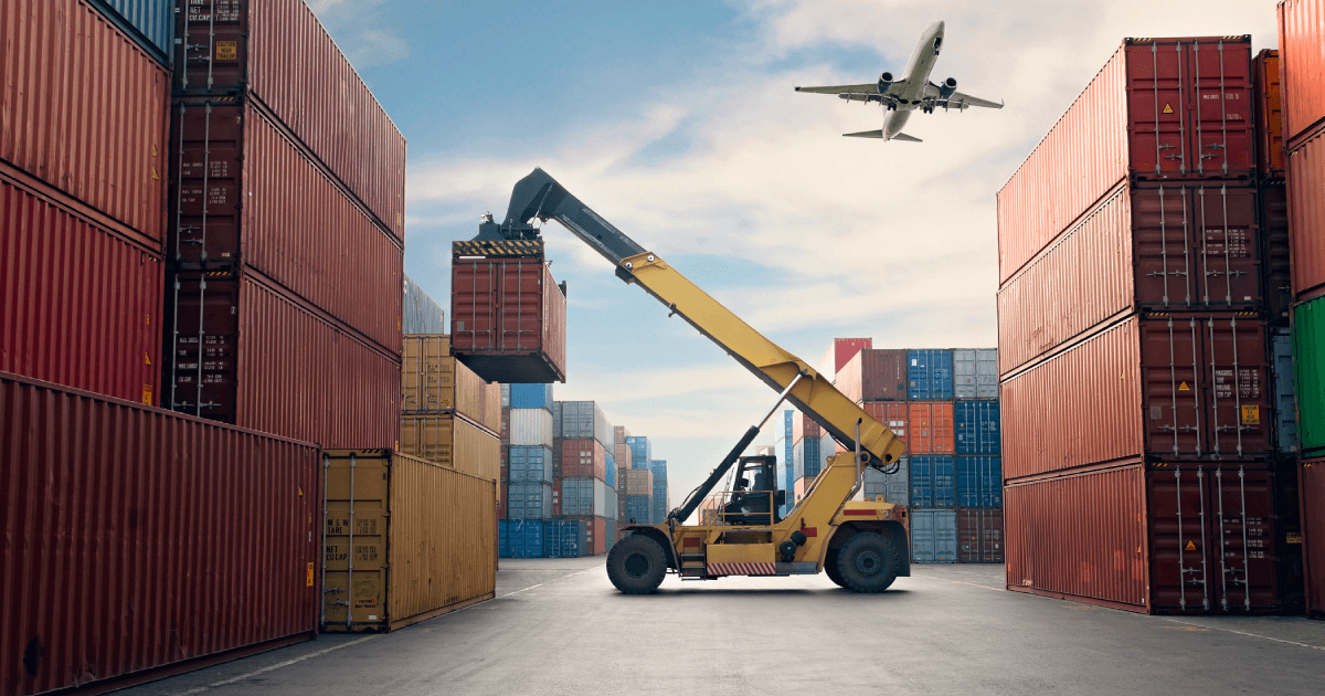 Plane flying over a storage crate facility