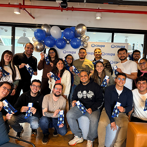 Group photo with celebration balloons