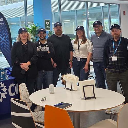 Group photo in a Coupa office