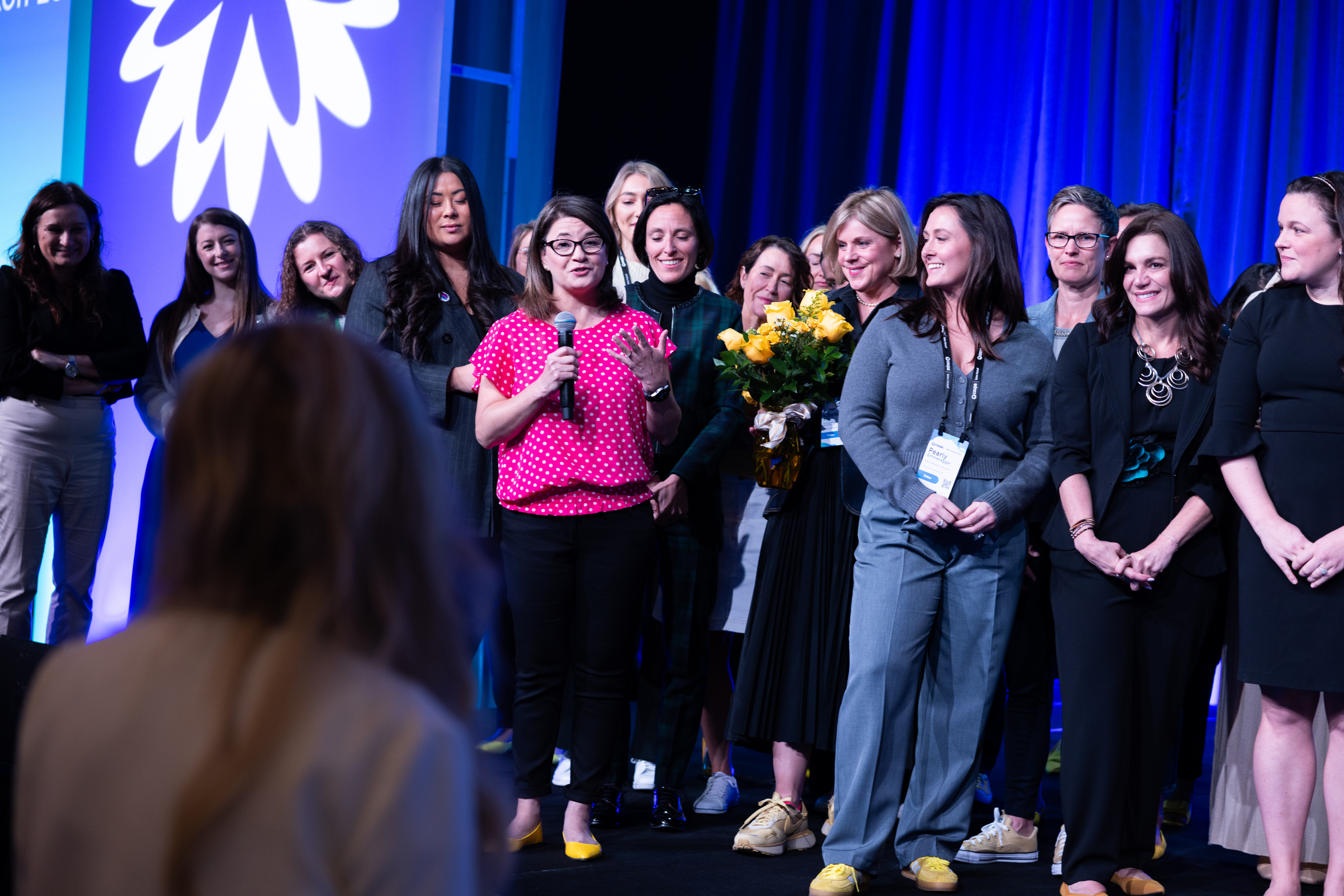 a group of Coupa women employees telling Coupa CEO Leagh Turner they are thankful for her as CEO
